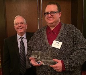 Retired food service director Ted Polk Sr. was on hand Friday when Ted Polk Jr. accepted the award on behalf of UIndy Dining Services.