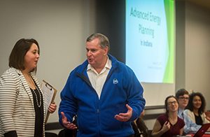 Senior Carly Nicholson, left, speaks with Visiting Fellow Greg Ballard. (Photo by D. Todd Moore, University of Indianapolis)