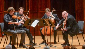 Debut performance of the faculty artist series String Quartet in the Ruth Lilly Performance Hall on November 7, 2016. Quartet is composed of Zachary DePue, violin; Austin Hrtman, violin; Austin Huntington, cello; and Michael Strauss, viola. (Photo by D. Todd Moore, University of Indianapolis)
