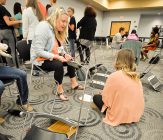 Public Health students, in conjunction with the physical therapy program, participate in a Poverty Simulation on May 23, 2017. (Photo: D. Todd Moore, University of Indianapolis)