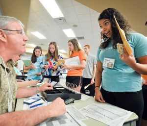 Public Health students, in conjunction with the physical therapy program, participates in a Poverty Simulation exercise in May 2017. (Photo: Todd Moore)