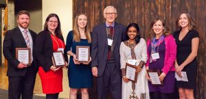 Photo: Stephen Jay (center), Yordanos Gebru (center-right) and other award recipients at the Indiana Public Health Association Annual Dinner. Photo credit: White Ox Creative