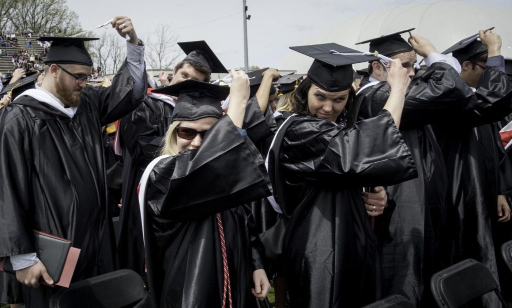students turning their tassles
to the other side