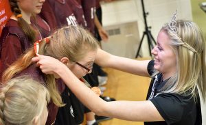 Photo from the 2017 tournament: Indianapolis 500 princess and UIndy student Madi Kovacs presented podium medals to some of the teams after their competition ended. 