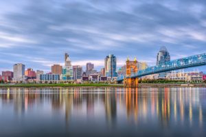 Cincinnati, Ohio, USA skyline on the river at dusk.