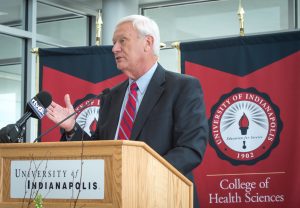 UIndy Health Pavilion dedication ceremony in the main atrium on Friday, October 2, 2015. On the podium: President Rob Manuel Bishop Michael Coyner, Indiana Area Resident Bishop for the United Methodist Church, Thomas Martin '72, chair of the Board of Trustees, Gene Zink, CEO Strategic Capital Partners, LLC, Anthony Lennen, president south region of Community Health Network, and Dr. Deborah Balogh, Executive Vice President and Provost. (Photo: D. Todd Moore, University of Indianapolis)