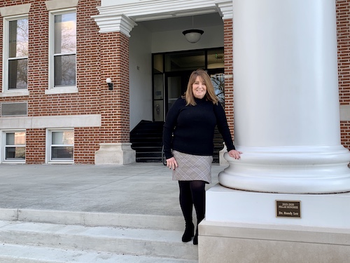 Linda Corn on the steps of Good Hall