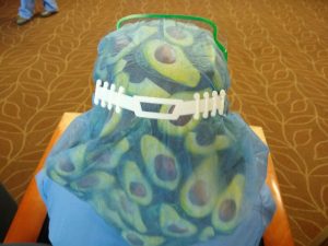 A nurse at an Indianapolis-area hospital wears one of the "ear-savers" produced by Paul Talaga. 