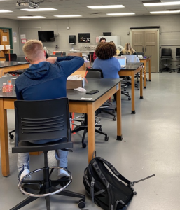 Students work on the biology kits in a lab room at Lilly Science Hall.