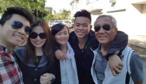 John Phan, second from right, with his family in Vietnam.