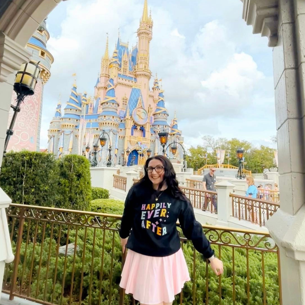 Abi Postma near the Disney World castle