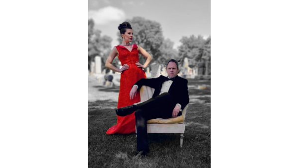 Photo of Jeanne and Terence Mayhue in a graveyard