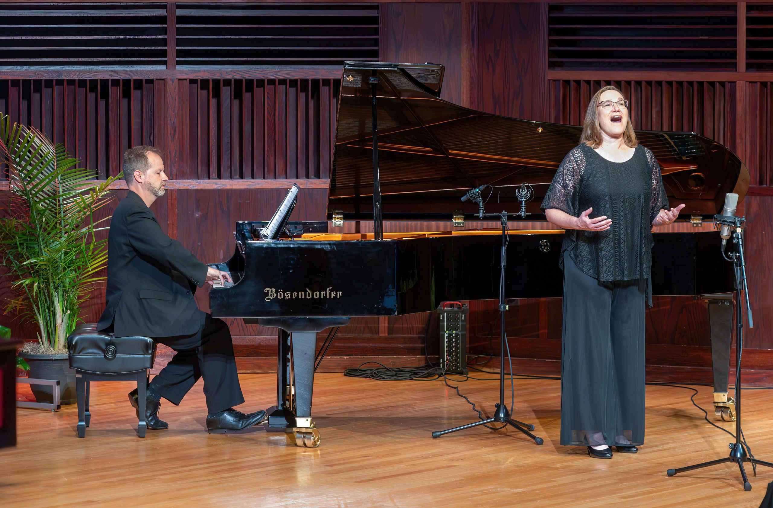 Mitzi Westra performs at 2023 UIndy Faculty Staff Institute, accompanied by pianist Gregory Martin