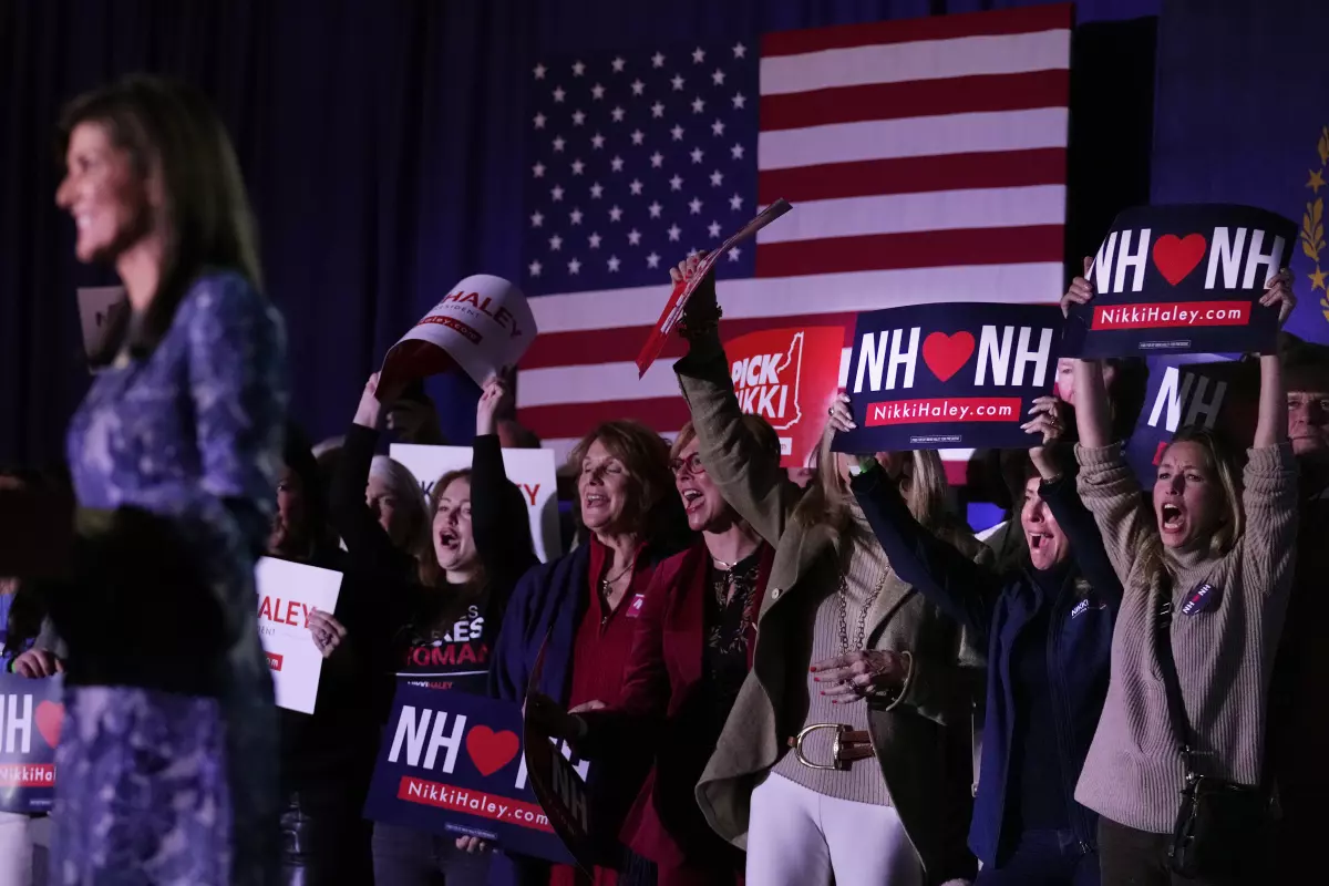 A crowd cheers Republican presidential candidate Nikki Haley’s second-place finish in New Hampshire on Tuesday. (Charles Krupa / Associated Press)