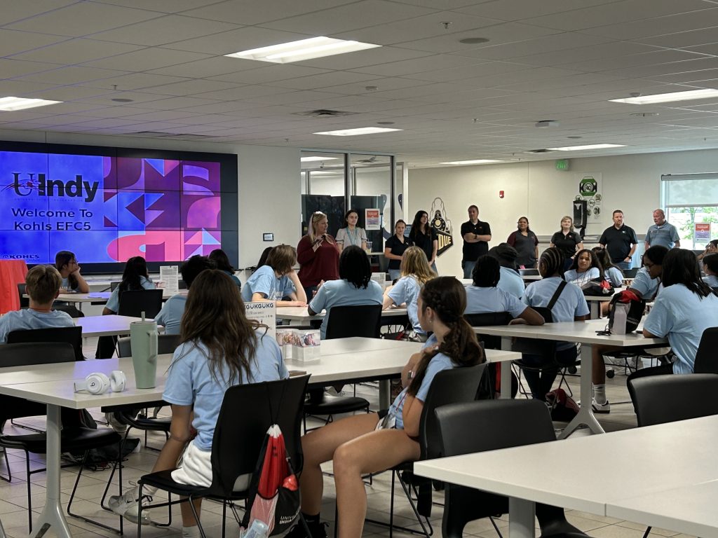 Students in the 2024 UIndy Summer Success Camp listen to a speaker at the Kohl's Distribution Center