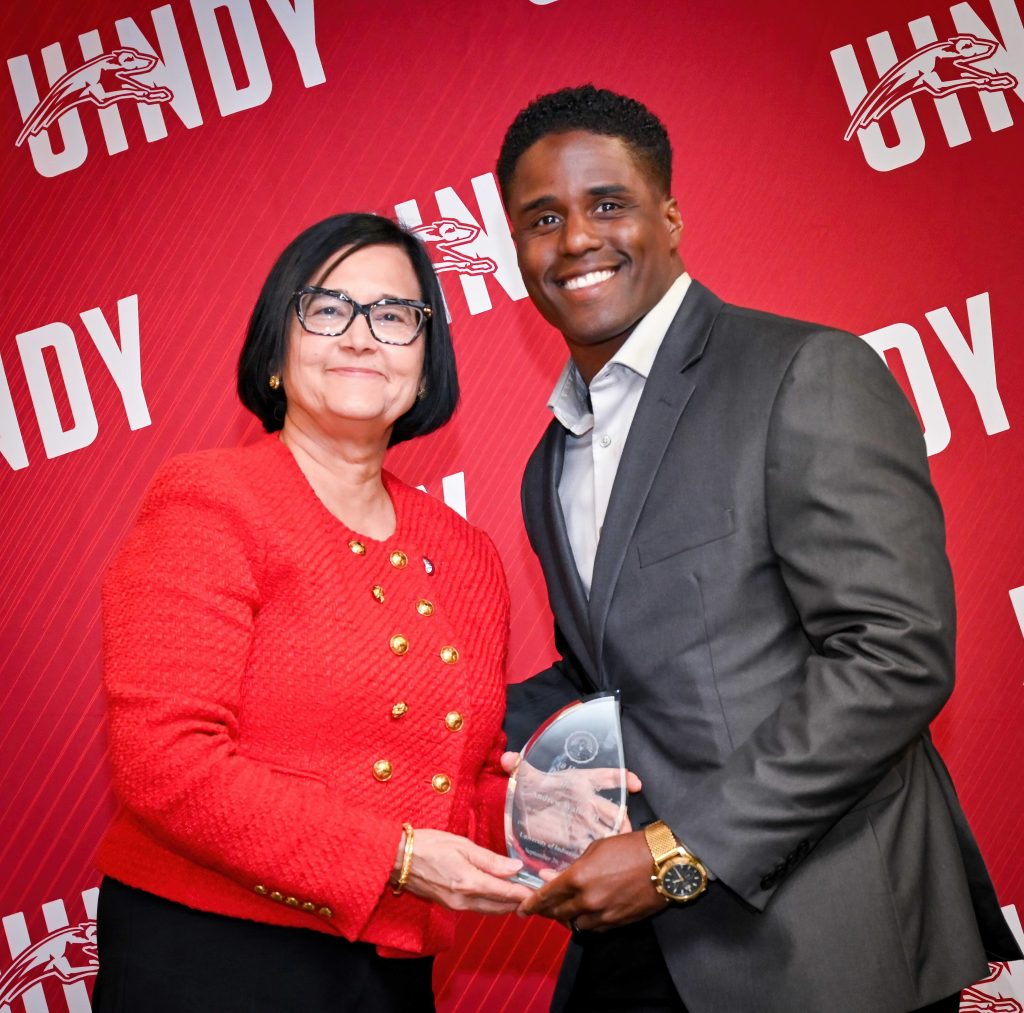 Photo of Andrew Walker II and President Tanuja Singh