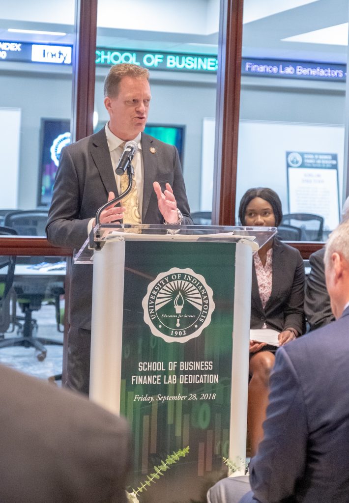 New Finance Lab dedication (bell ringing) on first floor of Esch  on Friday, September 28, 2018. It was named the Martin Family School of Business Finance Lab in honor of Tom Martin's service and dedication to UIndy.  (Photo:  D. Todd Moore, University of Indianapolis)