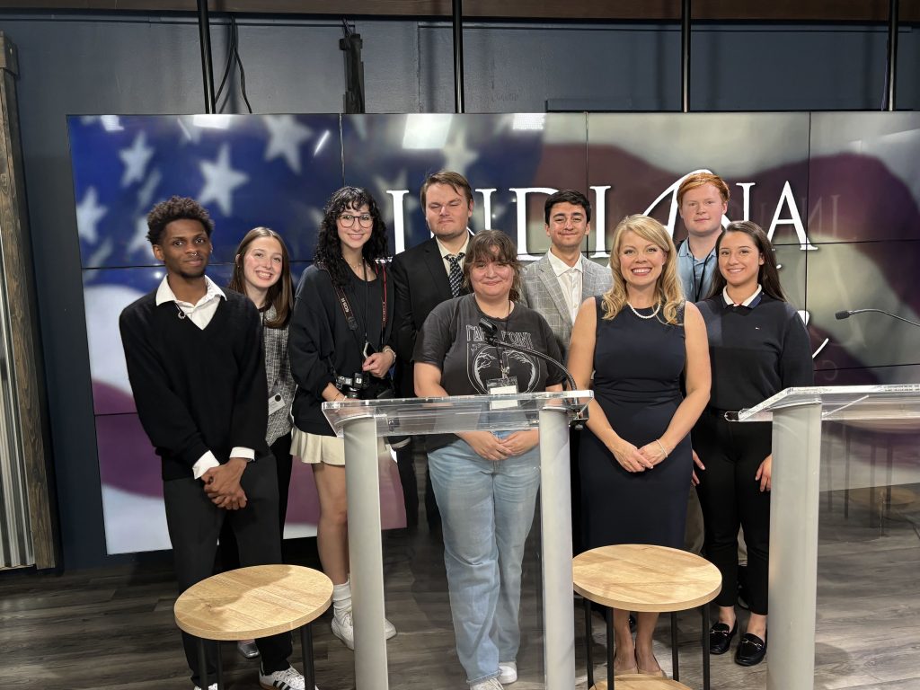 Group photo of Dr. Laura Wilson and her class at the 2024 U.S. Senate Debate