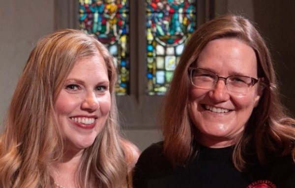 Close-up photo of vocalists Erin Benedict and Mitxi Westra