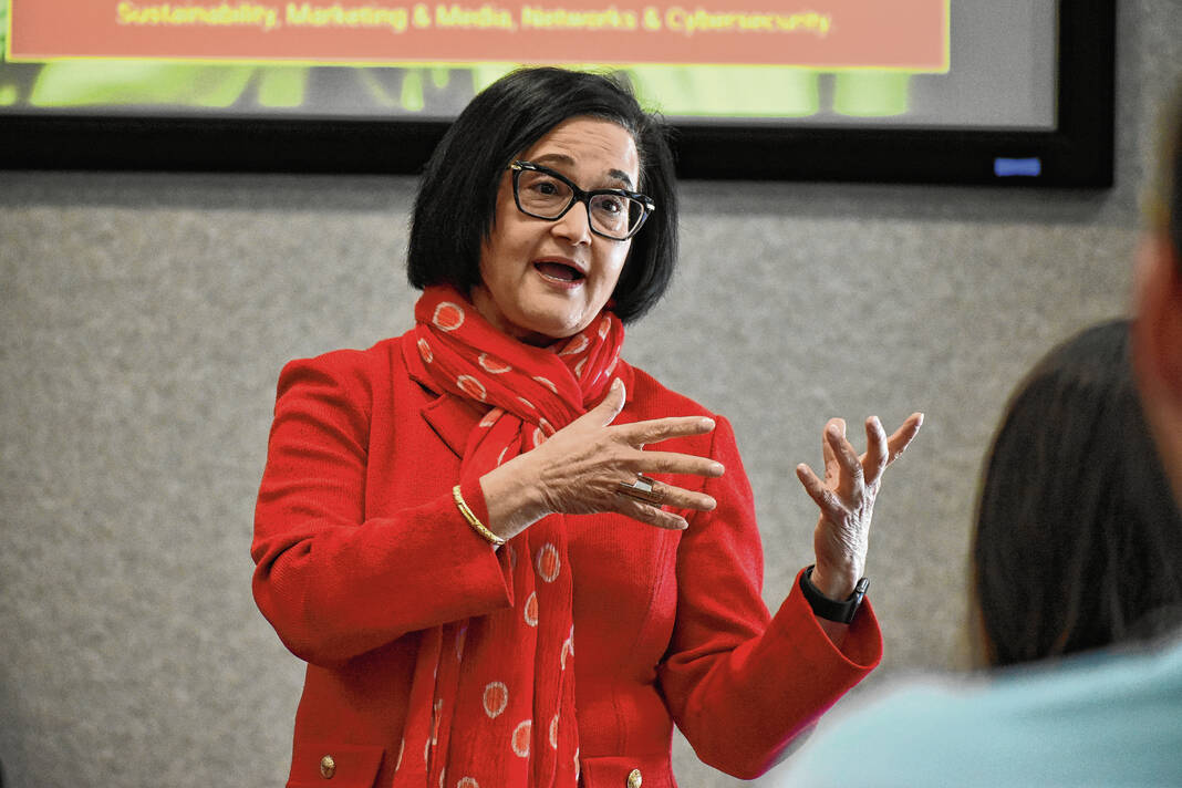 Daily Journal photo of UIndy President Tanjua Singh speaks to members of the Greenwood Rotary Club about the university Monday at Central Nine Career Center