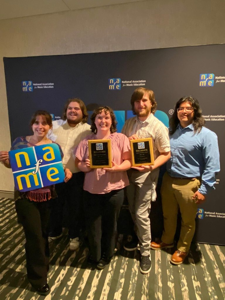Photo of members of the UIndy cNAfME holding their national awards