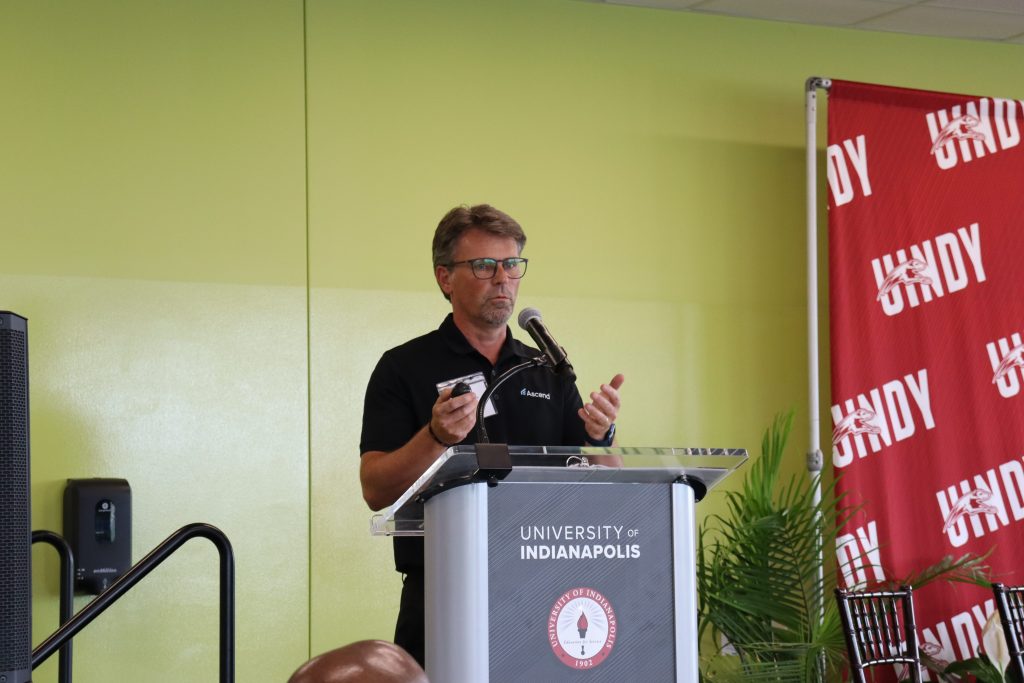 Photo of Brad Rhorer delivering keynote address at Meet UIndy