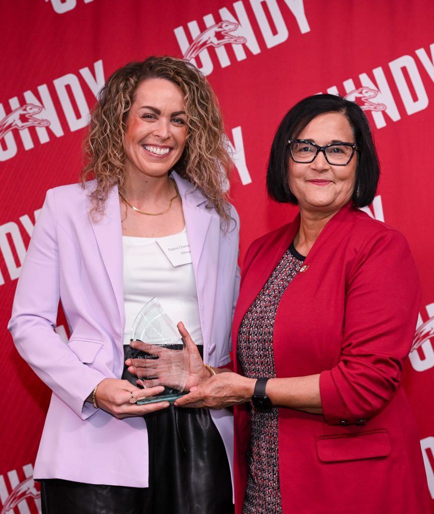 Photo of Dr. Dayna Charbonneau with UIndy President Tanuja Singh
