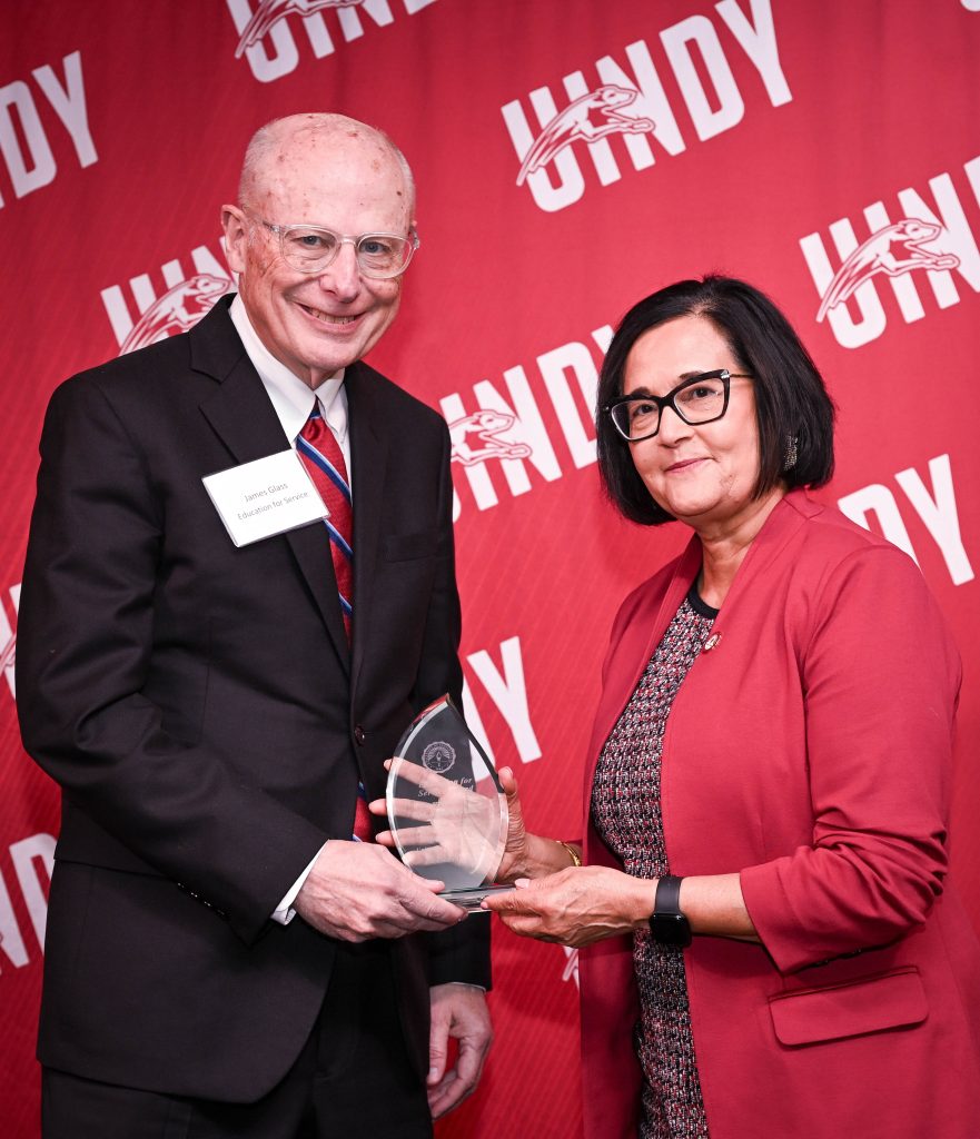 Photo of Dr. James Glass with UIndy President Tanuja Singh