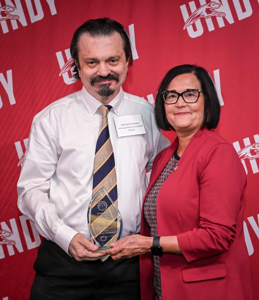 Photo of Dr. Michael Poulakis with UIndy President Tanuja Singh