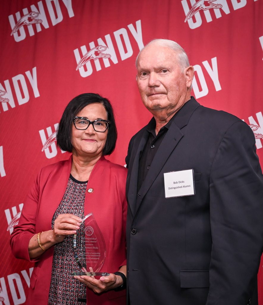 Photo of Dr. Robert Dicks Sr. with UIndy President Tanuja Singh