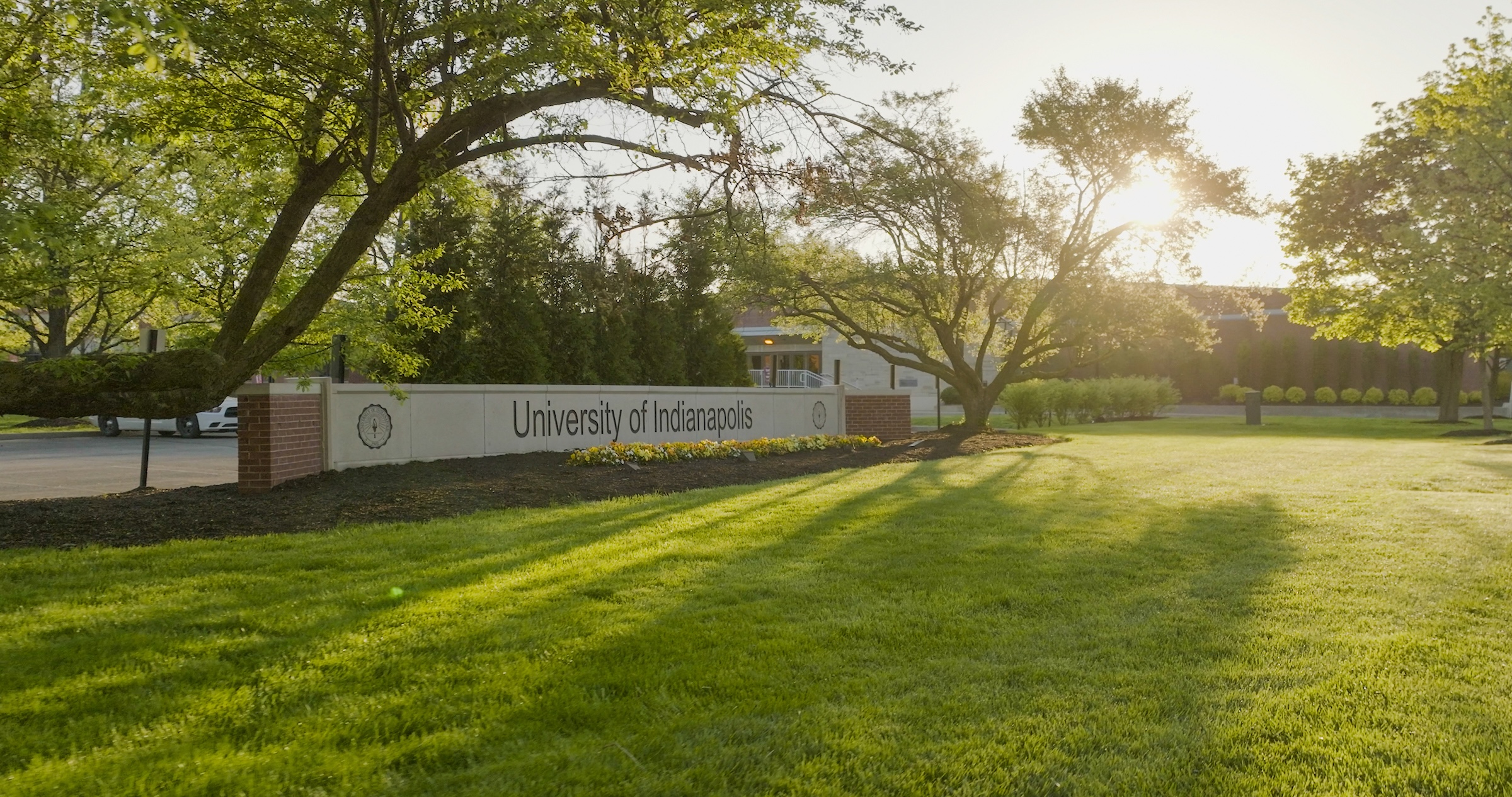 University of Indianapolis sign and campus