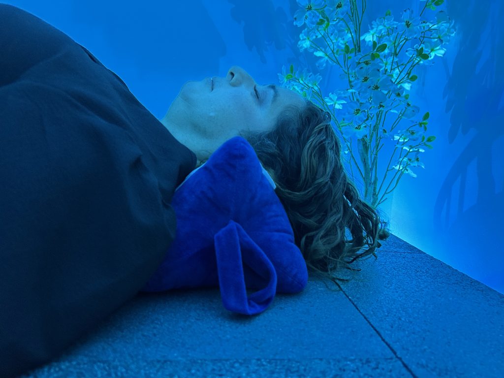 An individual relaxes on one of the lava beds inside UIndy's Biofeedback & Meditation Center on campus.
