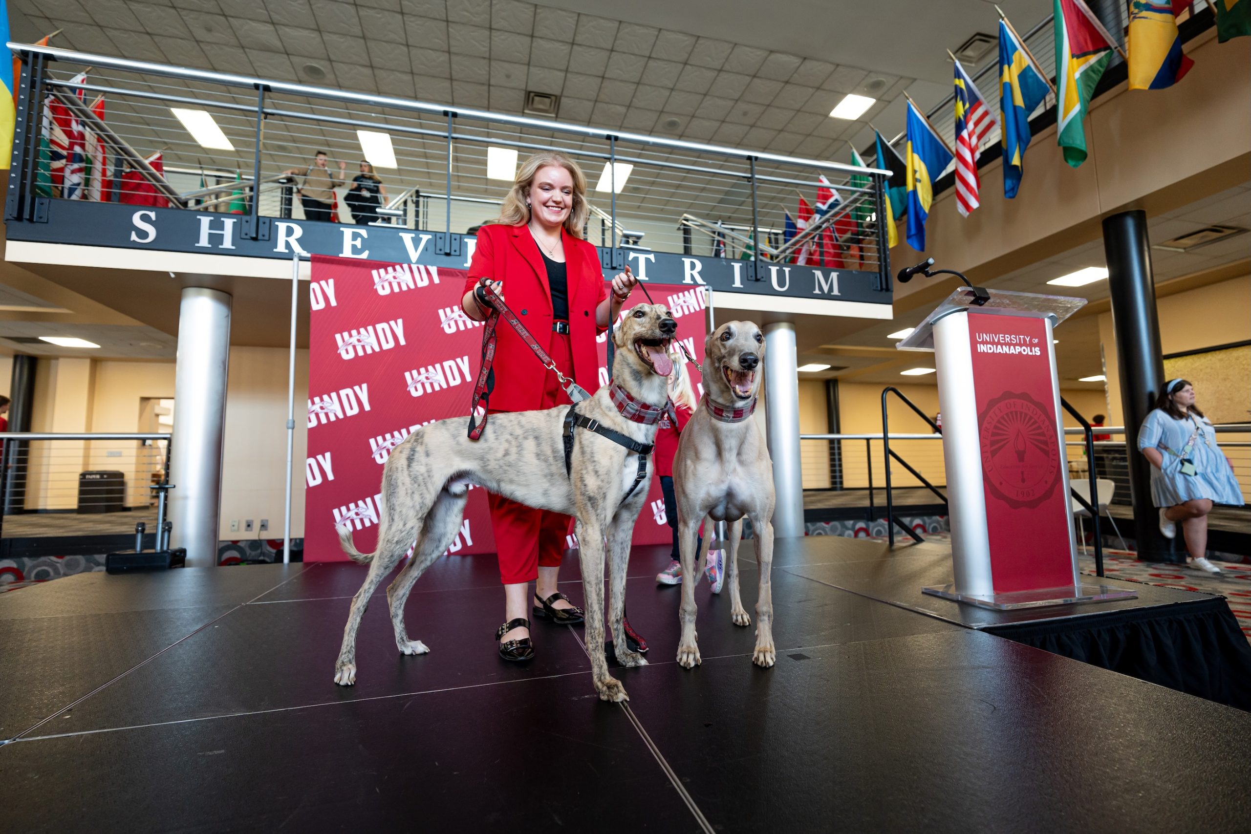 UIndy mascot handler Coran Sigman with Grady II (at left) and Grady.