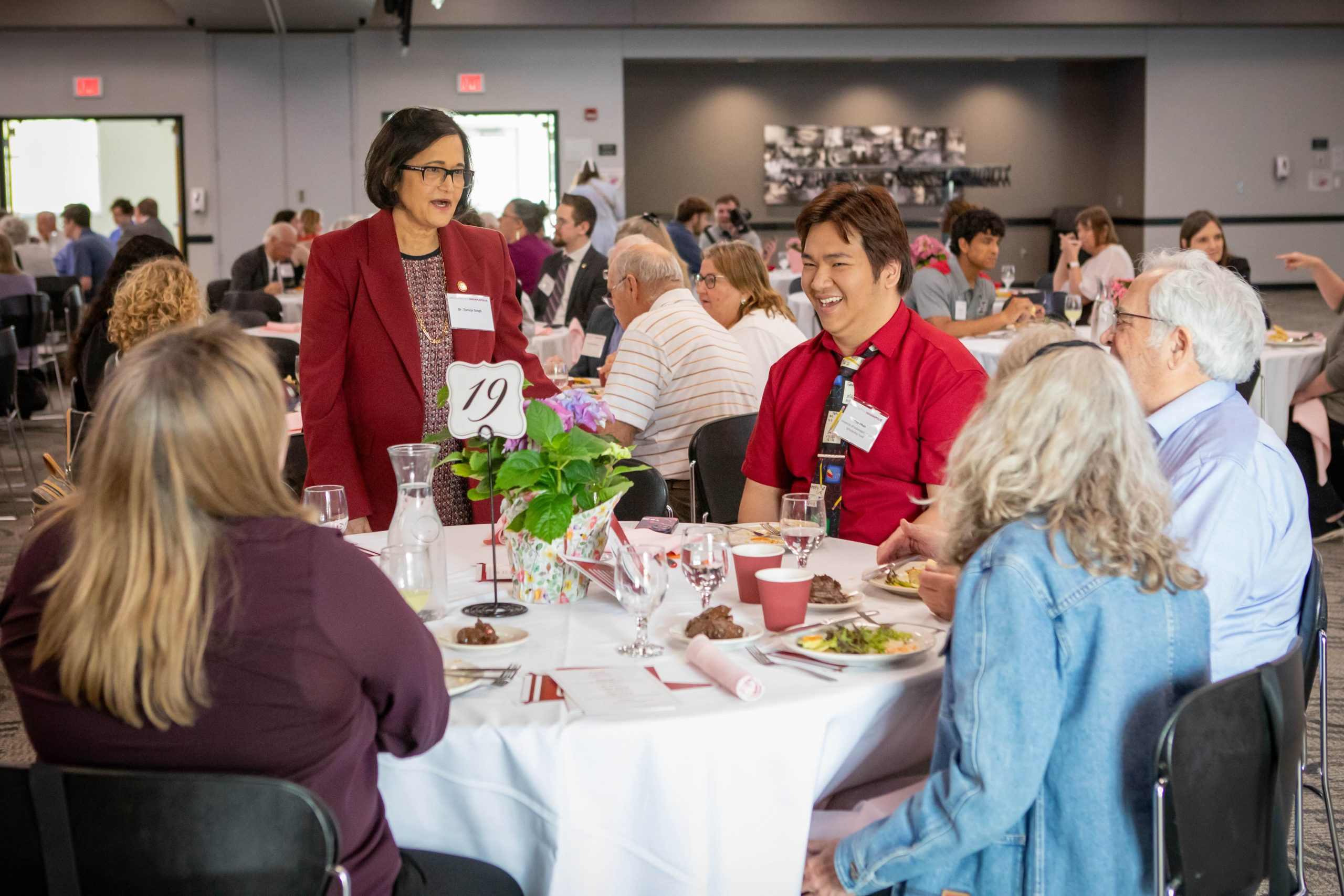 UIndy President Tanuja Singh speaks with donors and students at Philanthropy Lunch