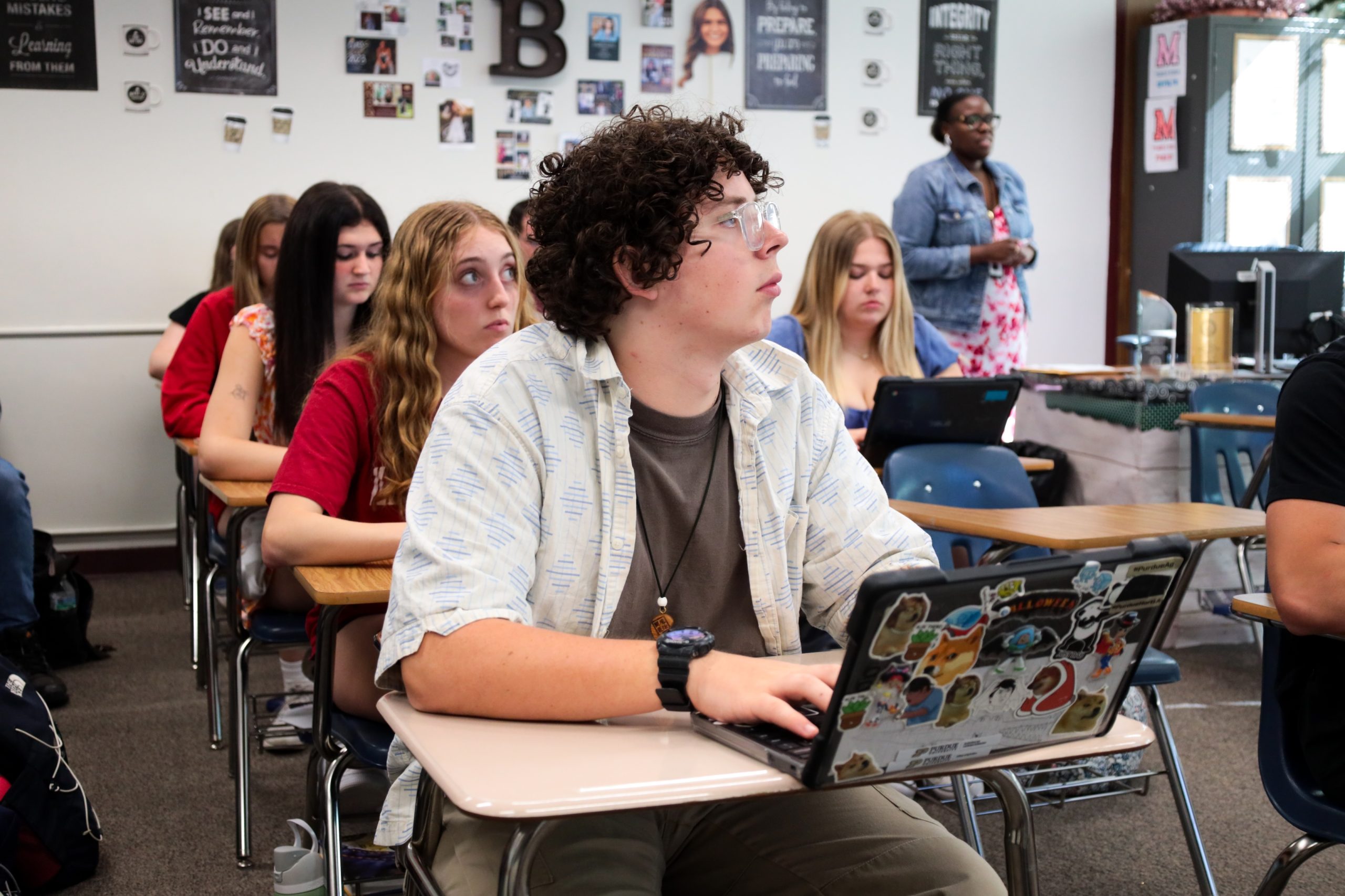 A high school student sits in class as part of the Early College program