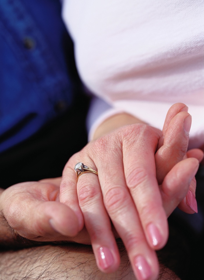Older couple holding hands Center for Aging & Community CAC