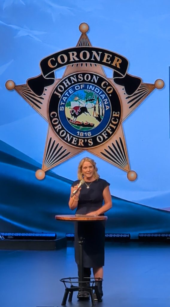 Kerria Carter, newly elected Johnson County Coroner, attends caucus in boot